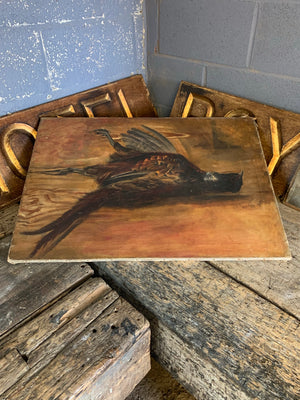 A pair of 19th Century oil paintings of game birds