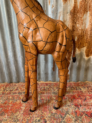 A large leather Liberty & Co. giraffe
