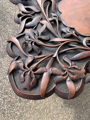 A profusely carved Anglo-Indian table by Jubbar Khan & Son