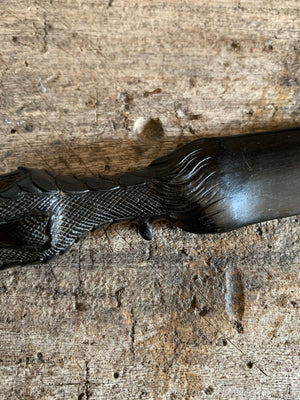 A Victorian carved ebony bird claw page turner