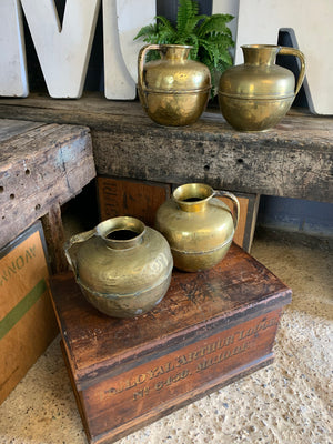 A 19th Century round brass water jug
