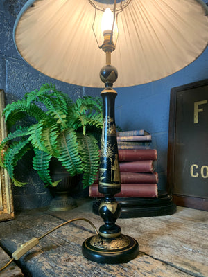 A black Chinoiserie table lamp