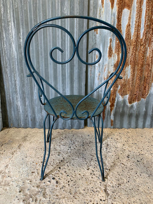 A set of four French blue wire work garden chairs