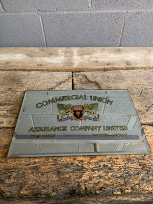A frameless advertising mirror for the Commercial Union Assurance Company Limited of Cornhill, London