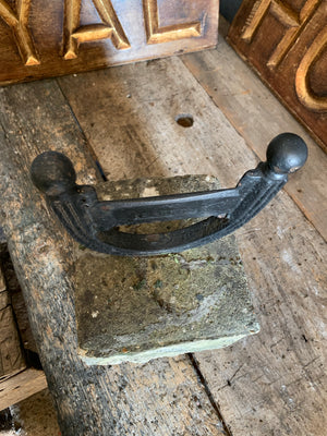 A large stone and cast iron boot scraper by Carron