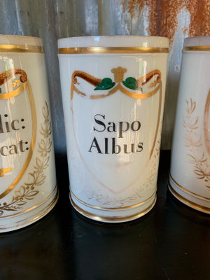 A set of three large French apothecary jars
