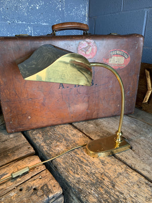 A brass banker's lamp
