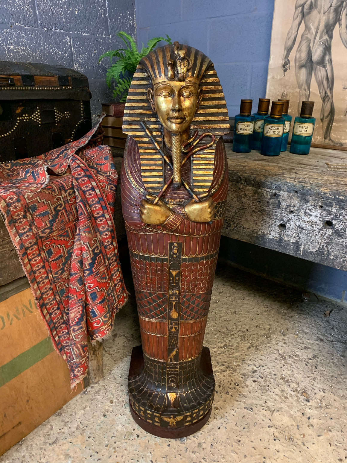 A large Egyptian Tutankhamen sarcophagus cabinet
