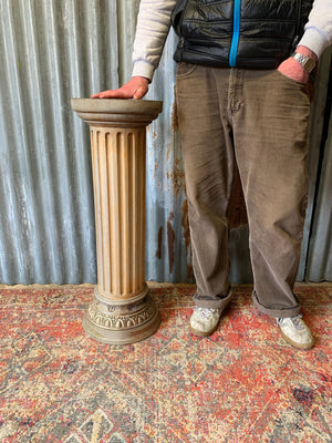 A carved wooden column