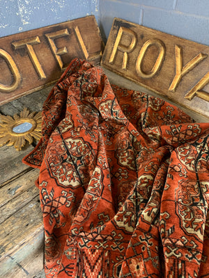 A large russet velvet throw or 'Dutch tablecloth'