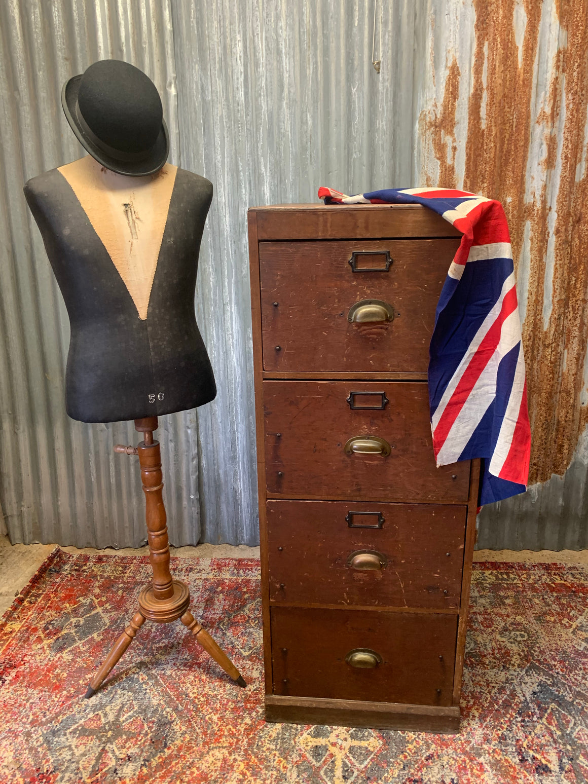 A WWII era wooden filing cabinet