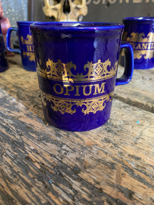 A full set of six cobalt blue apothecary mugs