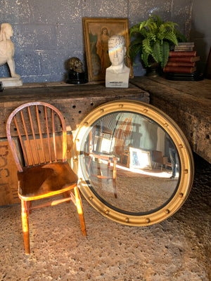 An extra large Regency style convex ball mirror