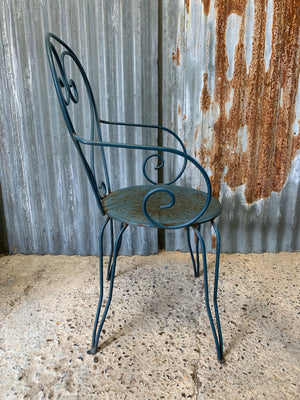 A set of four French blue wire work garden chairs