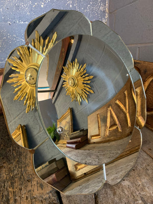 A large Art Deco flower convex mirror