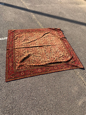 A large red ground velvet throw or 'Dutch tablecloth'