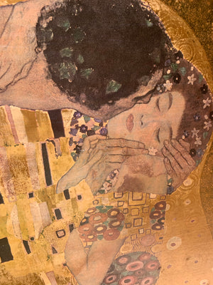 A large copy of The Kiss painting by Gustav Klimt
