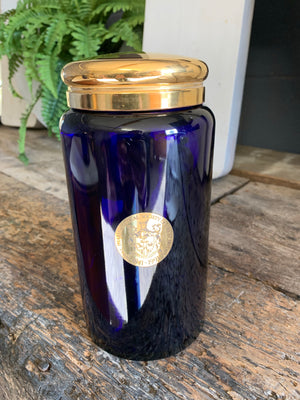 A cobalt blue glass myrrh apothecary jar by the Royal Pharmaceutical Society