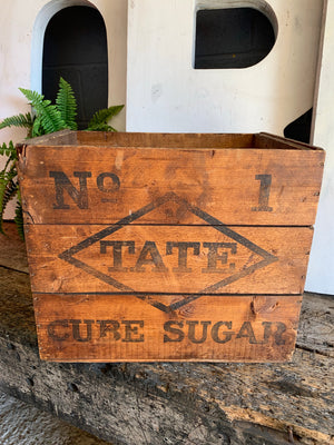 A stencilled Tate and Lyle sugar cube wooden advertising box