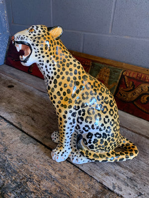A large terracotta leopard statue made in Italy