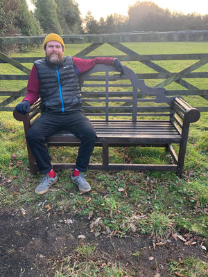 A large Lutyens wooden bench