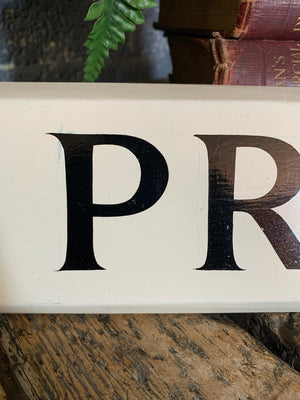 A hand painted wooden 'Private' sign