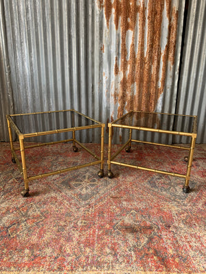 A pair of brass and glass Hollywood Regency faux bamboo tables