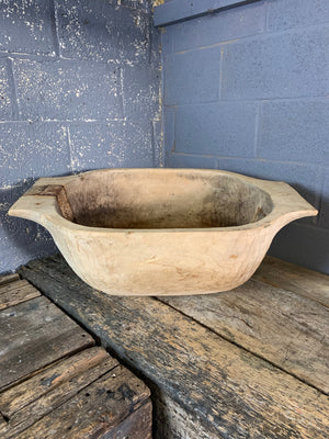 A very large wooden dough bowl