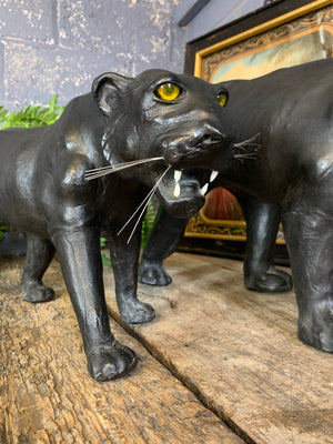 A large mid century black leather panther (56cm)