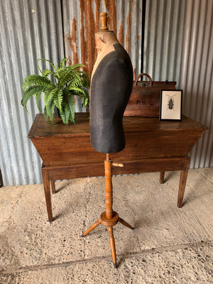 A French male mannequin on turned wooden stand