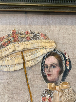 An unusual framed collage of a lady with a parasol