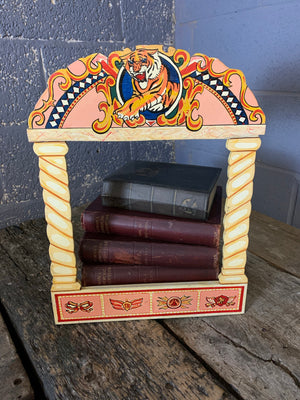 A hand-painted fairground style frame with tiger motif