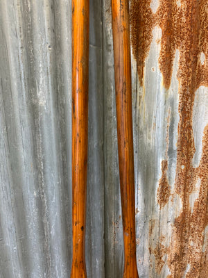 A pair of vintage wooden oars