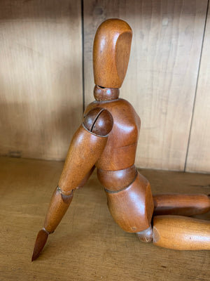 An early 20th Century female wooden lay figure