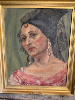 A large Spanish oil on canvas portrait of a lady in flamenco headdress
