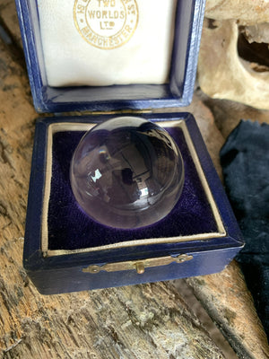 A Victorian Two Worlds Ltd fortune teller's cased crystal ball