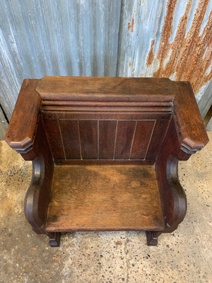 A small wooden 19th century church pew