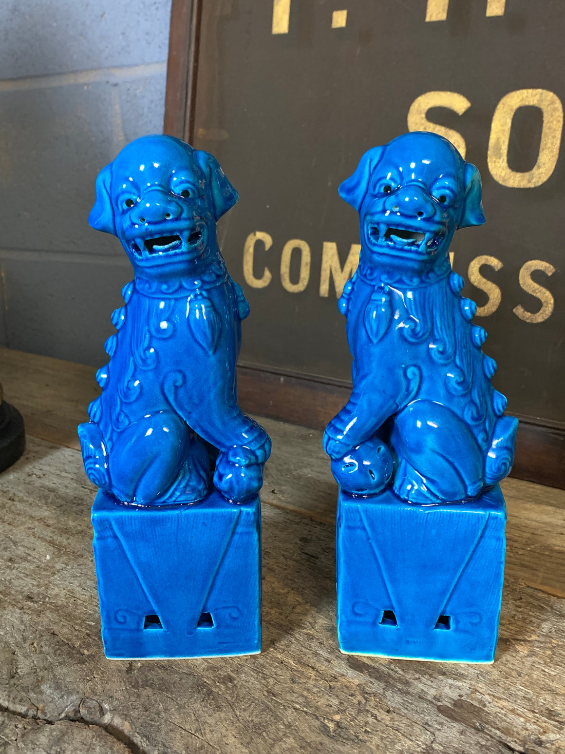 A pair of turquoise ceramic Chinese foo dogs