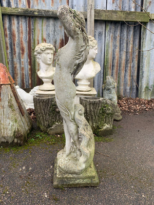 A cast stone statue of Venus