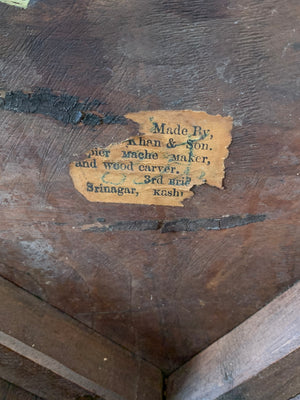 A profusely carved Anglo-Indian table by Jubbar Khan & Son