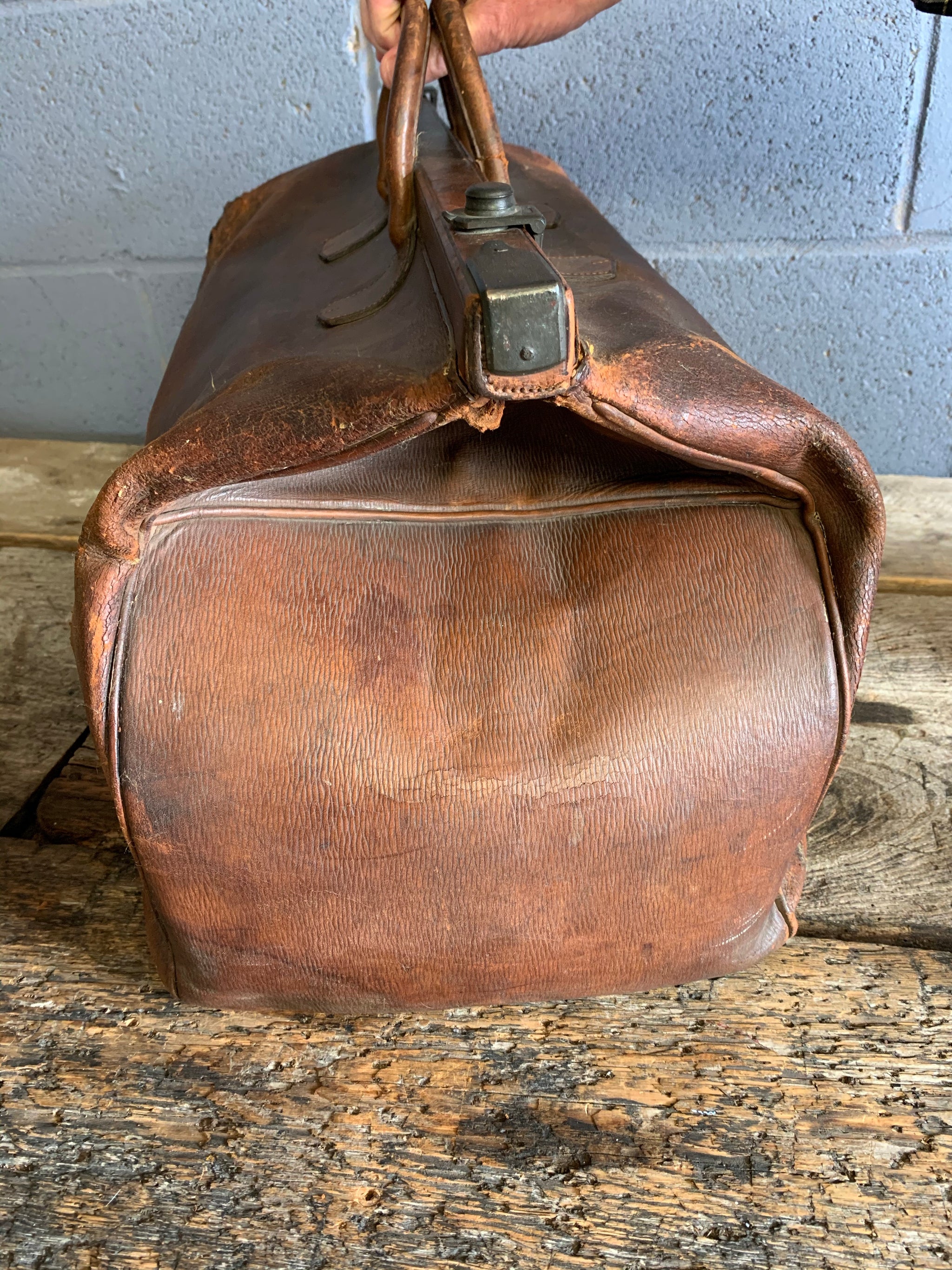 A large brown leather monogrammed Gladstone bag - Belle and Beast