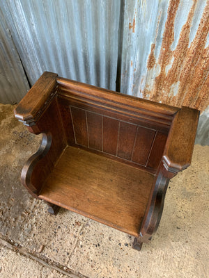 A small wooden 19th century church pew