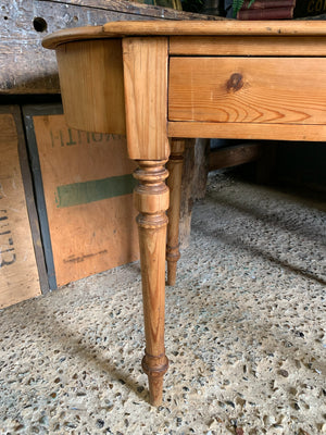 A Victorian pine breakfront table with two drawers