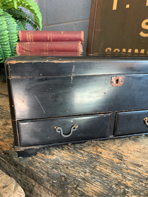 A Japanese black lacquered sewing box