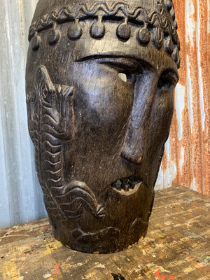 A large wooden carved Oceanian/Australasian tribal mask