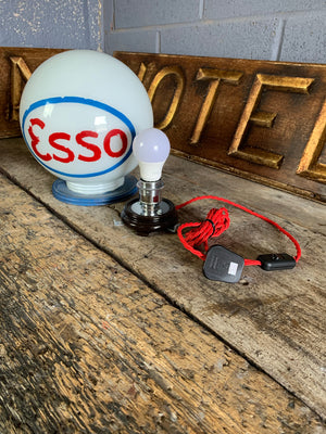 An Esso gas pump globe table lamp