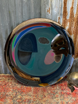 A very large concave parabolic mirror ~ 90cm