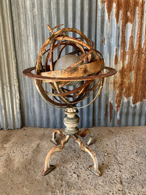A large cast iron armillary sphere