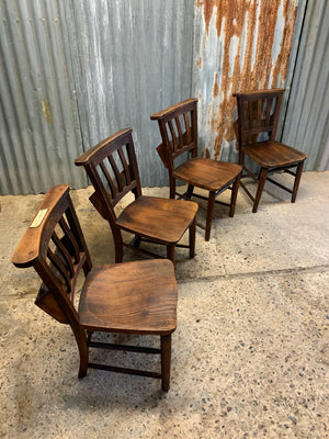 A set of 4 wooden 19th century chapel chairs