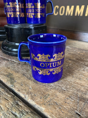 A full set of six cobalt blue apothecary mugs